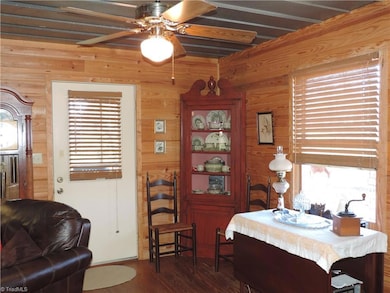 Breakfast or dining area with direct access to screened porch.
