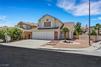 Traditional home featuring an attached garage, stu