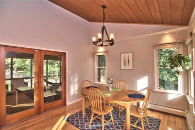 The Dining area features a vaulted T&G ceiling w/ 