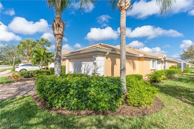 View of property exterior with a yard