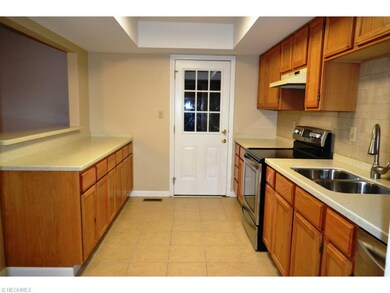 Corian counter tops, newer cabinets, ceramic tile 