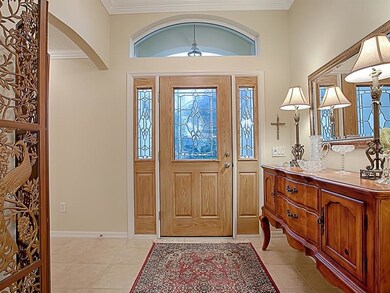 LEADED -GLASS FRONT DOOR LEADS INTO YOUR TILED FOY