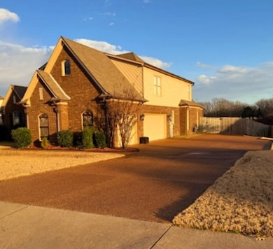 View of front of property featuring a  3 car garag