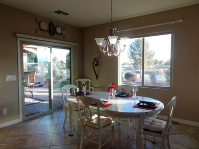 Dining view to lake & covered patio