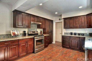 The kitchen has been meticulously remodeled with t