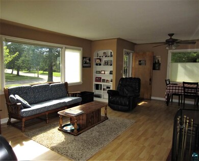 features coved ceiling, built-ins and wood burning