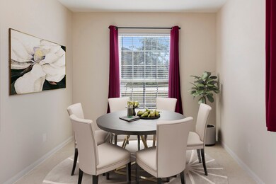 Imagine this space as a dining room. (virtually staged)