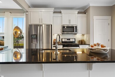 Upgraded white cabinets & stainless steel gas appl
