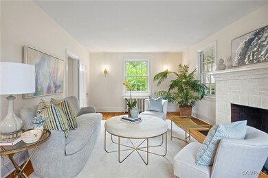 Living room with radiator heating unit, wood finis