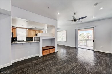 Unfurnished living room featuring dark wood-style