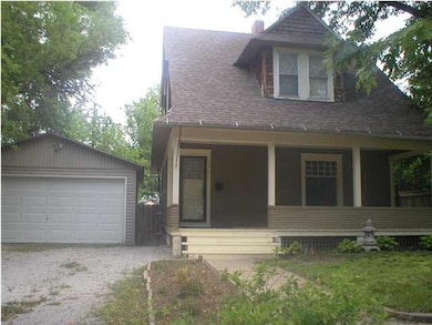 Oversized front porch to gather & visit with frien