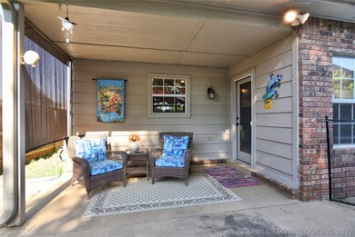 Step out to this nice covered patio that leads you
