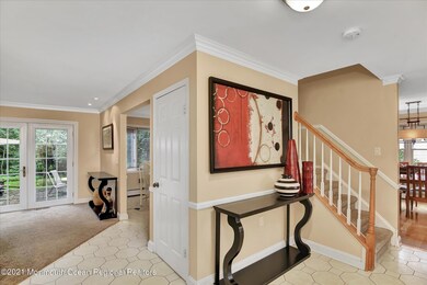 front hallway open to family room dining