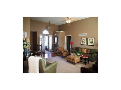 Large living room. Enry way has hardwood floor to 