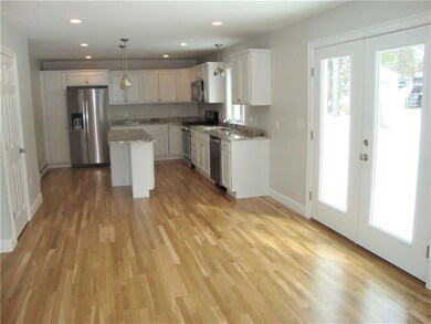 Open floor plan. View from Dining to...