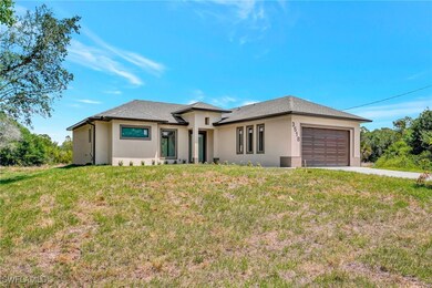 Prairie-style home featuring an attached garage, a