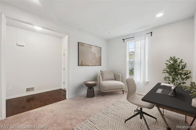 Front room can serve as sitting room, office or playroom