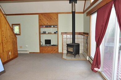 Living Room with Free Standing Fireplace