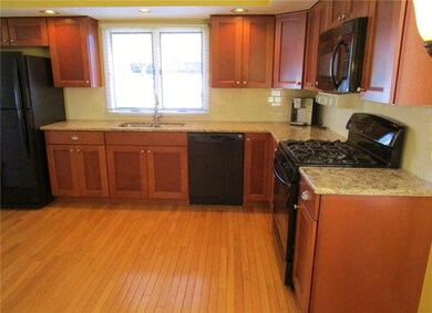 Kitchen:  Hardwood Floors, Granite Countertops, subway tile backsplash