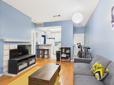 Living area with light wood-style floors