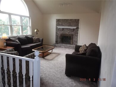 Living Room with Log Burning Fireplace