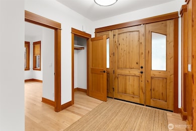 Spacious entry with double windows to let in abundant natural light