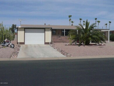 View showing 1 1/2 car garage