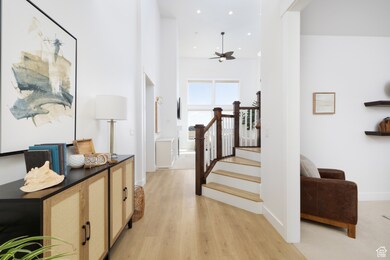 Corridor featuring recessed lighting, baseboards, and light wood-style floors