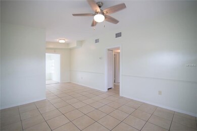 Front room looking to dining room and hallway with