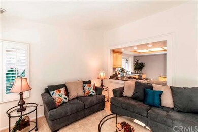 The other side of kitchen opens to living room