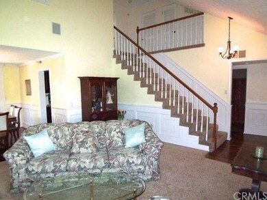 Living room w/surround sound, leads to formal dini