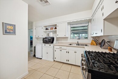 The kitchen provides ample space for cooking with