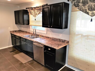 Another view of the kitchen