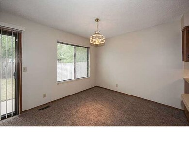 Dining room with doors leading out to patio