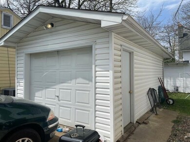 Single car garage for lower unit.