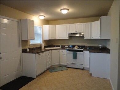 Kitchen boasts new cabinets, counter tops, gas ran