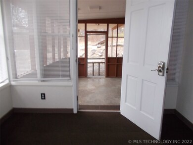 Taken from sun room to the entry way.