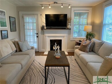 Living Room with glass door leading to screened po