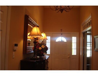 Entry/Foyer. Soaring entry with elegant chandelier