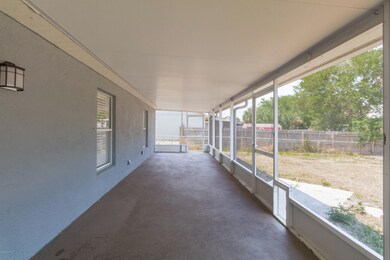Long Screened In Patio