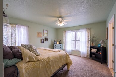 Master Bedroom faces Wooded Backyard