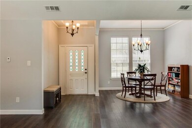 A bright and open foyer with durable vinyl wire br