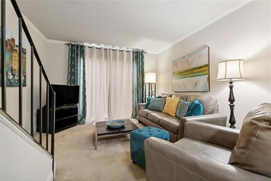 Comfortable living area with door to balcony