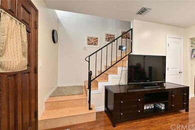 Living Room and Stairway from front entry
