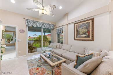 Living room with plenty of natural light, recessed lighting, ceiling fan, and light tile patterned floors