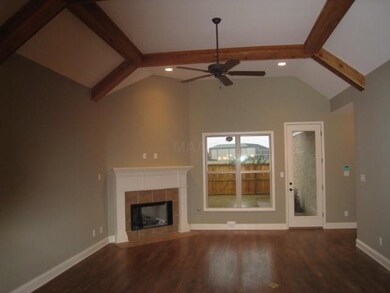 Large Hearthroom w/beamed ceiling