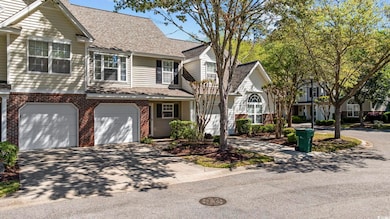 View of front facade featuring concrete driveway, 