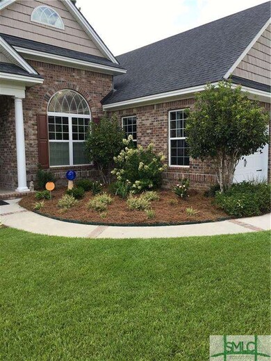 front yard landscaping. Fully sodded yard front an