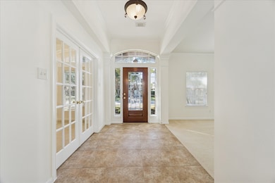 Entry reverse view looking towards the leaded front door with sidelights.