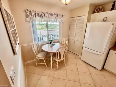 Dining space featuring light tile patterned floors